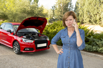 desperate confused woman stranded with broken car engine crash accident calling on mobile phone