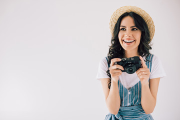 smiling woman with photo camera