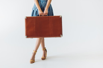 woman holding suitcase