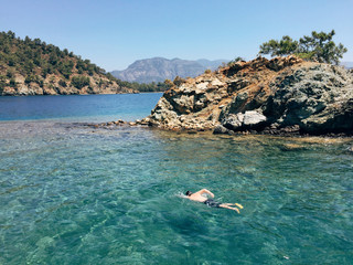 snorkeling in turquoise water Mugla, Turkey