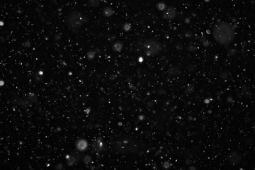 snow on a black background texture overlay bokeh highlights