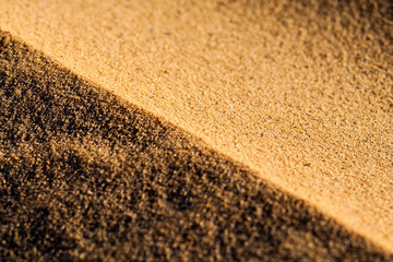 Close up macro texture of sand dune in Sahara desert.