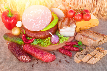Meat products.Smoked ham,sausage,bacon,vegetables