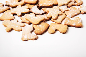Gingerbreads on white background.Copy space.Minimalistic style.