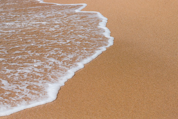 Sand beach and wave