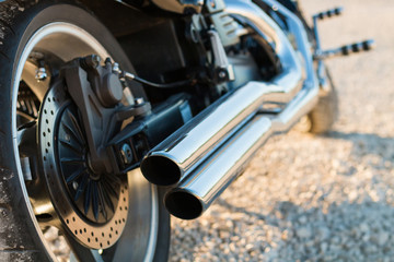 Exhaust and motorcycle engine closeup