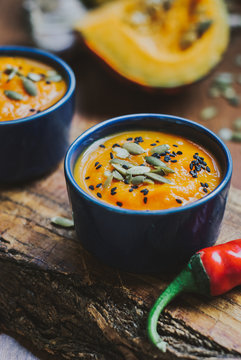 Homemade vegetable soup with pumpkin with cream and black sesame, pumpkin seeds