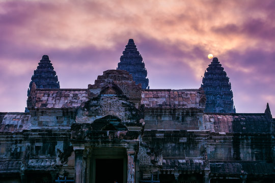 Amazing view of Angkor Wat temple at sunrise. The temple complex Angkor Wat in Cambodia is the largest religious monument in the world. Location: Siem Reap, Cambodia. Artistic picture. Beauty world.