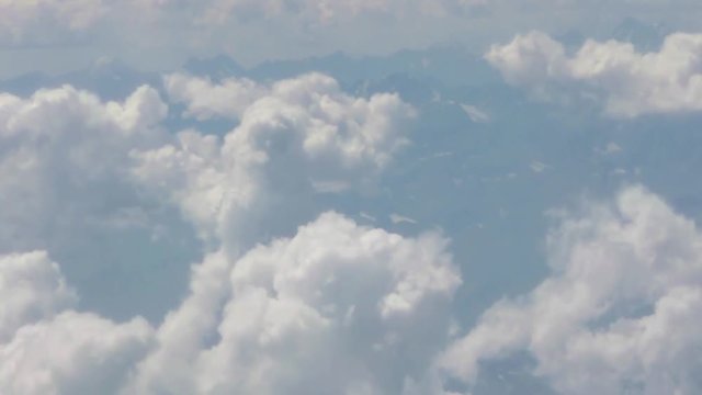 Passing Over Clouds In Blue Sky - Slide - Right To Left 