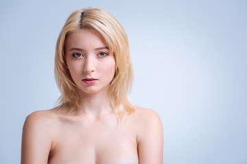 Fototapeta premium Concentrated female model looking seriously