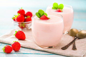 Homemade pink  yogurt with fresh berries strawberries