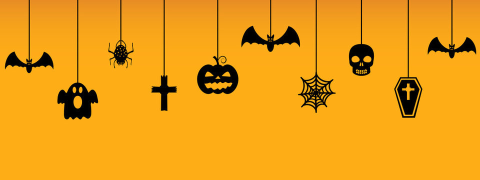 Halloween hanging ornaments on orange background