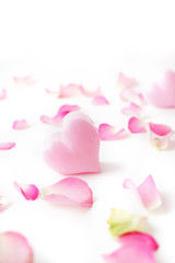 Fototapeta na wymiar pink heart and rose petals