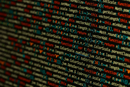 Real Java Script code developing screen. Programing workflow abstract algorithm concept. Closeup of Java Script and HTML code.