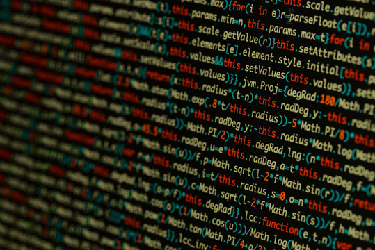 Real Java Script code developing screen. Programing workflow abstract algorithm concept. Closeup of Java Script and HTML code.