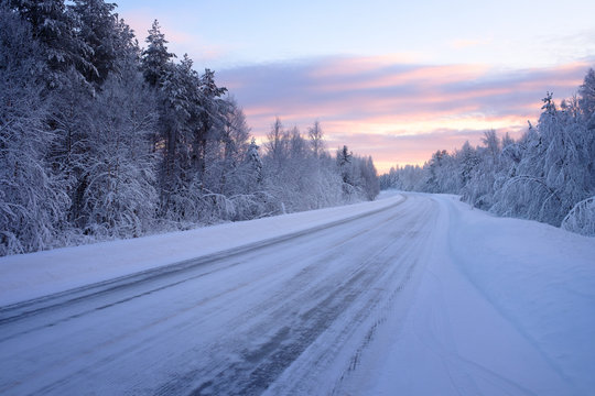 Beautiful snowy road in winter landscape