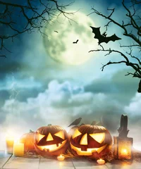 Fototapeten Spooky halloween pumpkins on wooden planks © Jag_cz