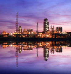 Reflection of petrochemical industry on sunset colorful sky2