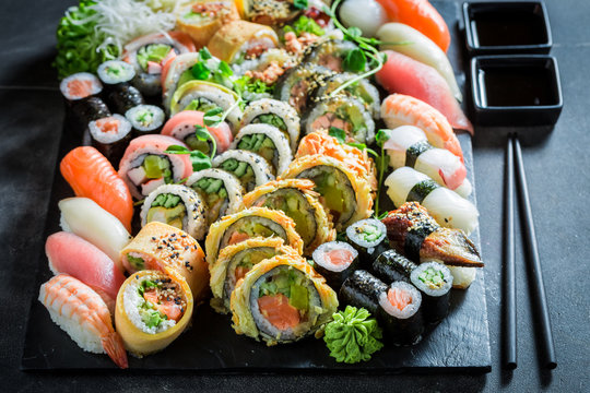 Tasty sushi set made of salmon and avocado