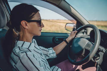 Woman driving car