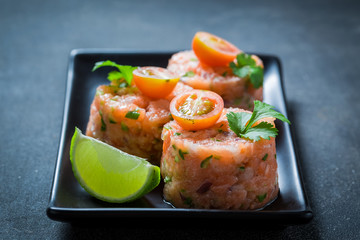 Fresh salmon tartare with coriander and lime