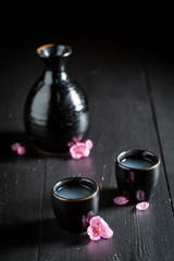 Ready to drink sake on black table