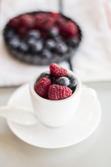 Healthy mixed fruit and ingredients with strawberry, raspberry, blueberry, blackberry from top view