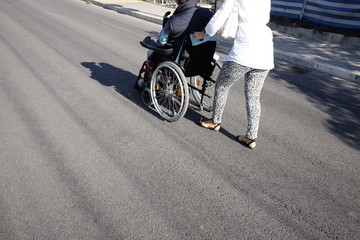 Fototapeta na wymiar elderly on wheelchair