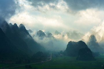 Vietnam landscape with mountain and low clouds in early morning in Trung Khanh, Cao Bang, Vietnam