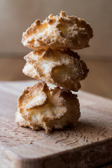 Coconut Cookies on wooden surface.