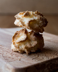 Coconut Cookies on wooden surface.
