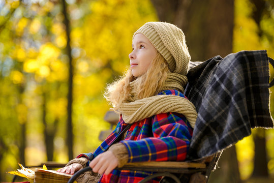 teenager girl in autumn park