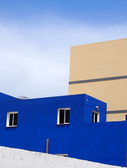 blue concrete house with modern cubic design