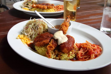 Turkish rice is a famous local dish in Nagasaki, JAPAN in which tonkatsu, pilaf and spaghetti are served together on one plate.