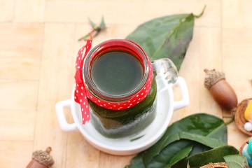 Bamboo grass juice or Tiliacora triandra (bai-ya-nang)