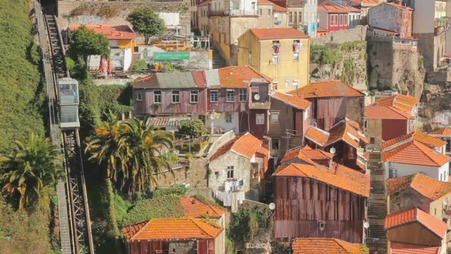 Guindais Funicular (Funicular dos Guindais) and picturesque houses in historic centre of Porto, Portugal.