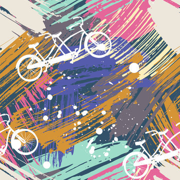 Seamless pattern with cute bicycles tandem on abstract watercolor stains, paint brushes freehand strokes