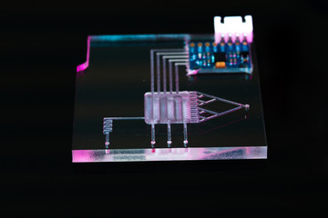 A lab-on-a-chip (LOC) is integration device with several laboratory functions