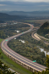 light paths on evening highway near Povazska Bystrica, Slovakia