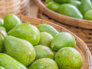 Closeup of avocado in the basket in the market.