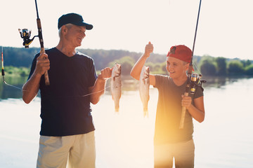 The old man and the boy caught two big fish on their spinnings