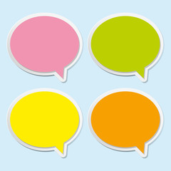 Four speech bubbles on light blue background