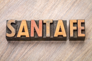 Naklejka premium Streszczenie słowo Santa Fe w typografii typu drewna