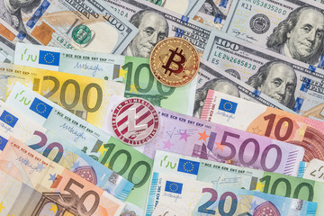 Litecoin and bitcoin with dollar and euro bills. business concept