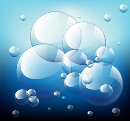 Shiny bubbles on blue background