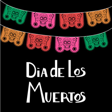 Dia de Los Muertos, Mexican Day of the Dead card, invitation. Party decoration, string of lights, handmade cut paper flags, skull, floral decor. Old wooden background.