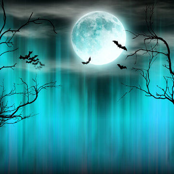 Spooky Halloween background with old trees silhouettes.