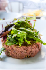 tasty Steak tartare (Raw beef) - classic steak tartare on white plate
