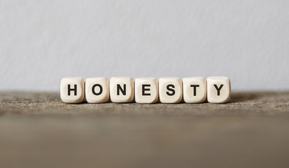 Word HONESTY made with wood building blocks