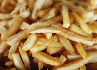 Many french fries. Yellow and crispy